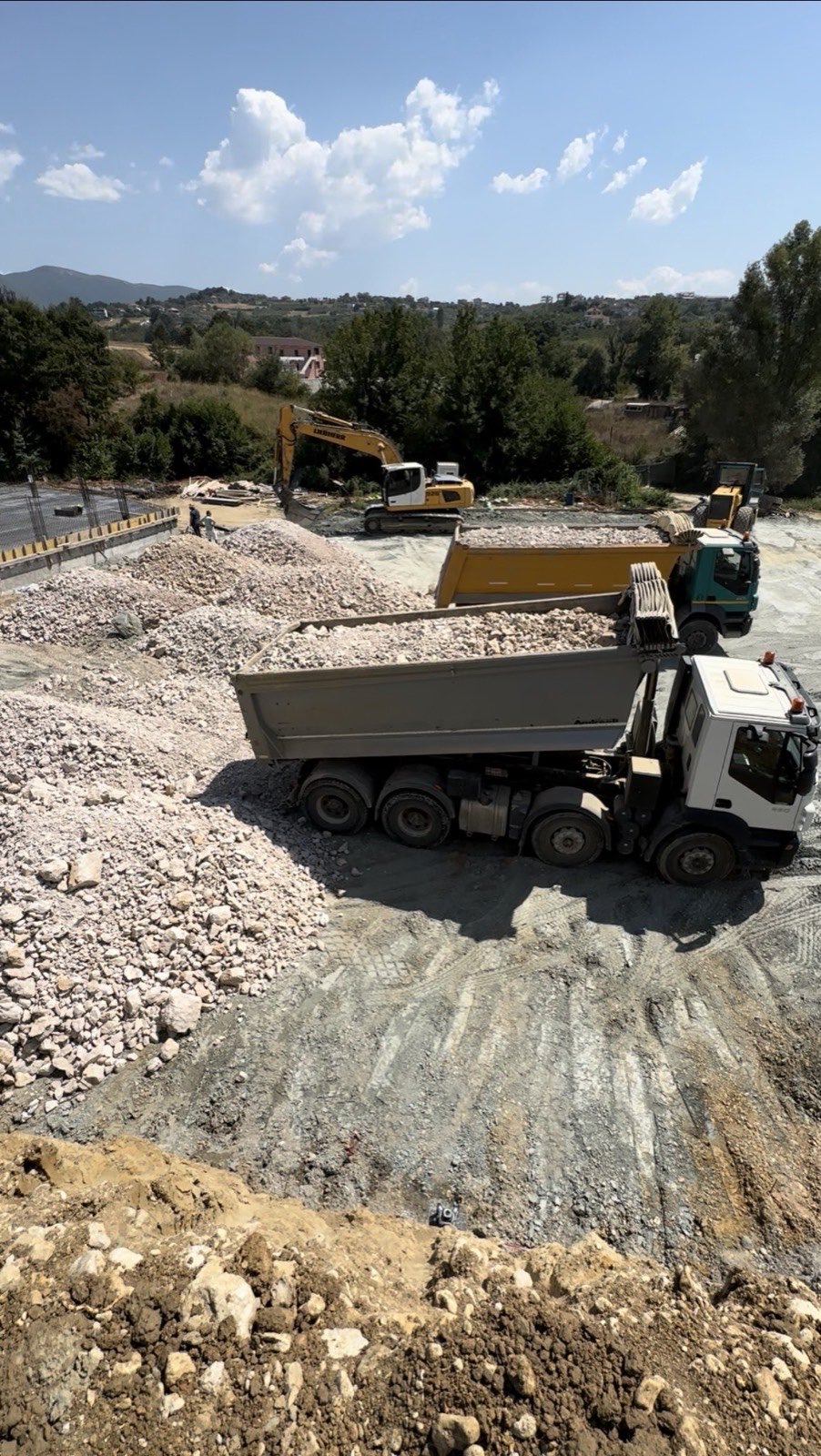 Joy Construction tipper truck loaded with material